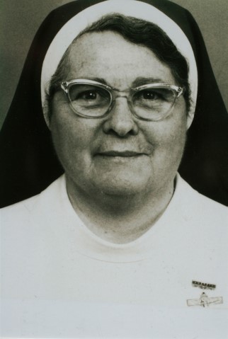 Portrait of a religious sister in traditional habit representing the school’s Catholic heritage and faith tradition